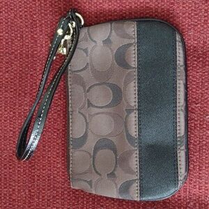 Rich Brown and Lovely Coach Wristlet